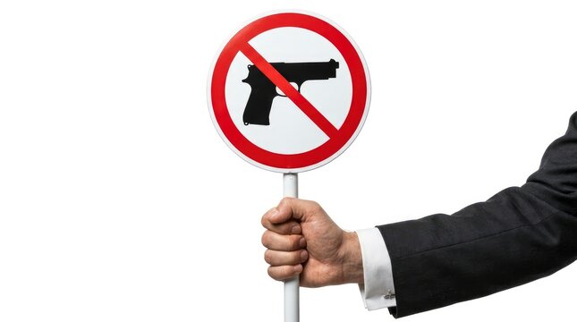 Hand in suit holding a no guns prohibition sign