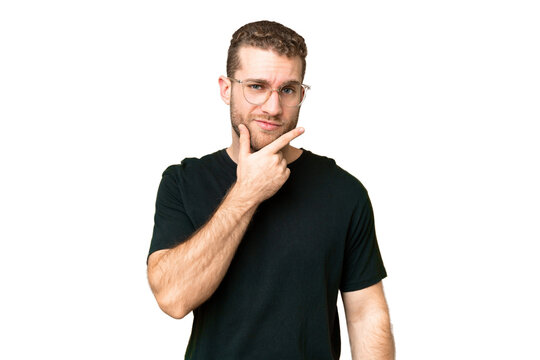 Young handsome blonde man over isolated chroma key background thinking
