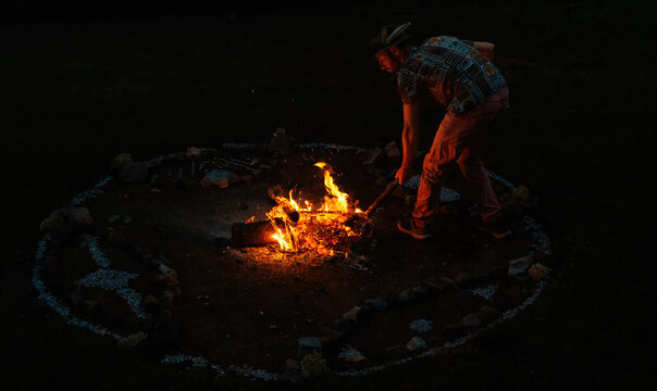 Sacred Fire Pit Decorated with Ceremonial Mandala Ornaments and Stone Circle.