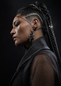 Empowerment Embodied: A striking portrait of a woman with bold hairstyle and intricate adornments, exuding strength and resilience.