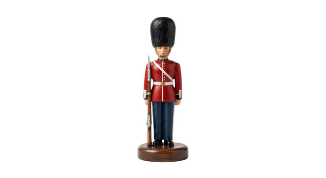 Wooden toy soldier nutcracker figurine in traditional red uniform