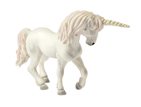White unicorn figurine representing fantasy and magic