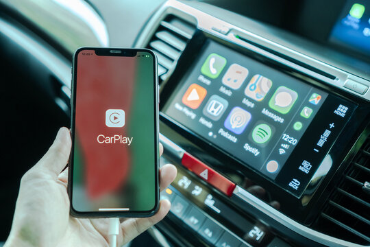 BANGKOK, THAILAND-16 May, 2019: Apple CarPlay app on iPhone, smart mobile application connected to Honda car for travel map, hand free phone call, online music on transportation vehicle safety