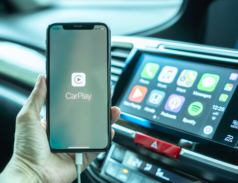 BANGKOK, THAILAND-16 May, 2019: Apple CarPlay app on iPhone, smart mobile application connected to Honda car for travel map, hand free phone call, online music on transportation vehicle safety