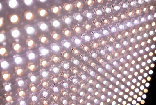 Extreme close-up of a bright LED spotlight panel for photo and video shoots. Technology, illumination, electricity, Light equipment for movie production, photo shooting.