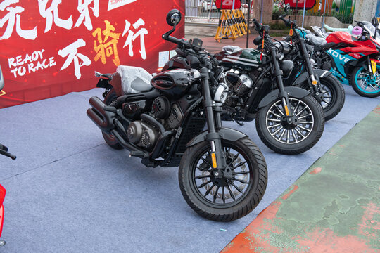 ZhongShan GuangDong China-April 11 2026: Benda BD350-15A black retro cruiser motorcycle displayed at outdoor motorcycle event.