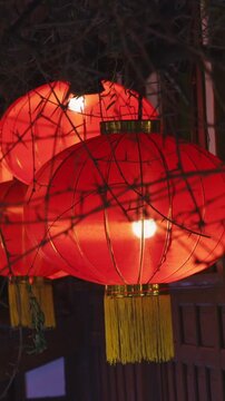 Chengdu, Sichuan, China. Traditional Red Chinese Lanterns, close-up View. Paper Lantern Is Symbol Of Hearth, Comfort, Kindness. Night Illumination. In Asian Culture Red Is Color Of Sun And Joy