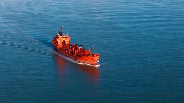 LPG tanker ship underway on commercial route with gas cargo on board. Maritime fuel transport for global supply chain and energy distribution