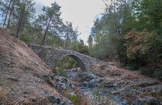 Elia medieval Venetian Bridge, a one-arch stone-built narrow bridge over the Diarizous River, located at the south-western end of Paphos Forest, Fini village, Limassol district, Cyprus