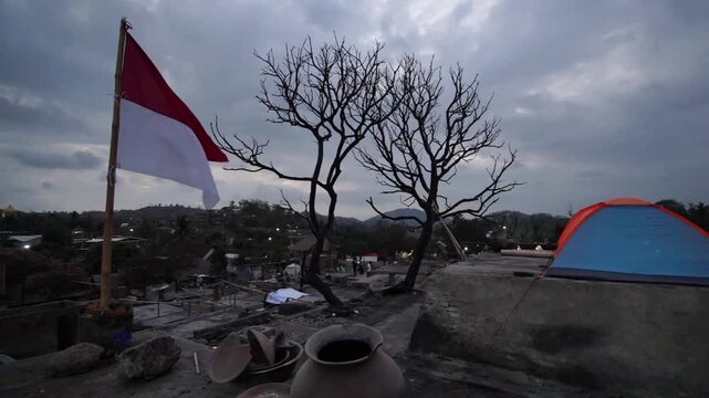 Lombok, Indonesia 30 August 2026 : Sasak Sade Lombok, Devastating fire destroying traditional thatched-roof houses in the cultural village of Sasak Sade, Lombok, Indonesia.