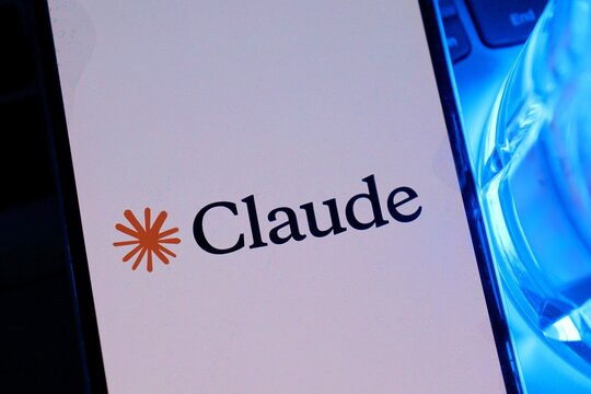Salvador, Brazil - August 29, 2026: Claude AI logo on smartphone screen. Claude app. 