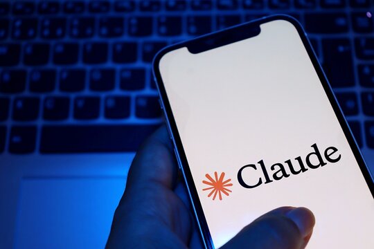 Salvador, Brazil - August 29, 2026: Claude AI logo on smartphone screen. Claude app. 