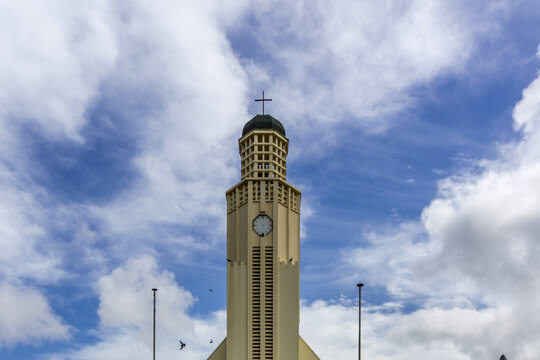 Old protestant church bell tower with cross in Oranjestad Aruba