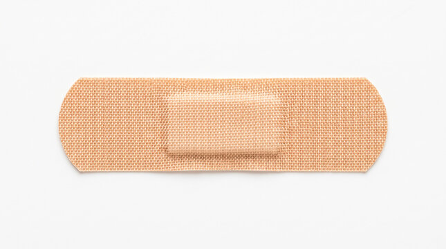 Adhesive bandage strip isolated on white background for medical first aid and wound care