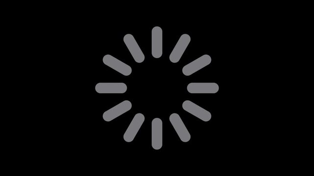 Minimalist grey loading spinner icon with twelve radial segments isolated on a solid black background, representing digital progress or waiting state