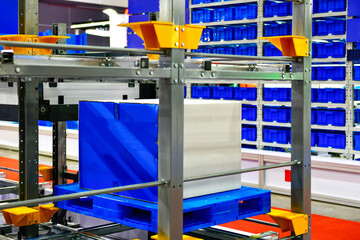 Industrial cardboard box package stored on automated racking system in smart logistics warehouse © I Viewfinder