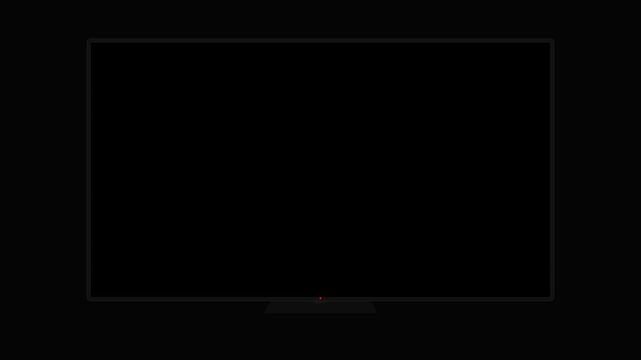 Modern flat screen television turning on with white glowing screen isolated on black background