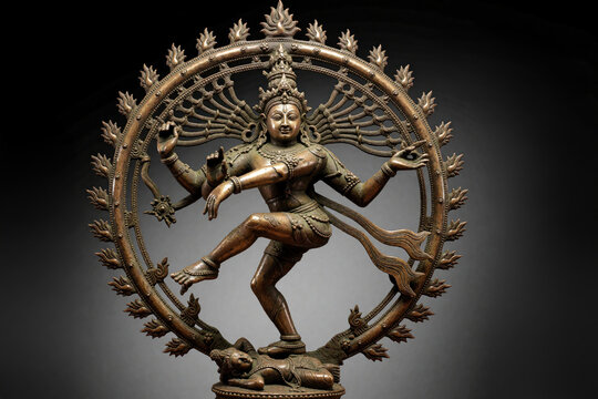 Detailed bronze sculpture of Shiva Nataraja, the Hindu god of cosmic dance, performing his tandava. This divine figure represents creation and destruction in balance.