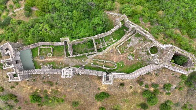 Ruins of medieval fortress Maglic on top of hill by the Ibar river in Serbia. On the wall of medieval fortress Maglic