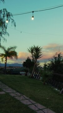 Silhouette of a terrace at sunset with grass to admire the panorama in Calabria