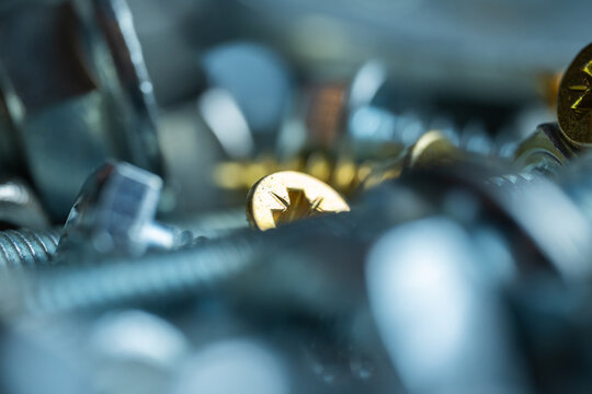 Close-up of various metal screws and bolts