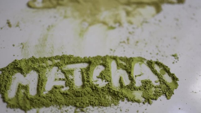 Matcha powder comparison shows vibrant green high quality tea beside pale low quality powder revealing visible differences in color freshness texture and premium grade
