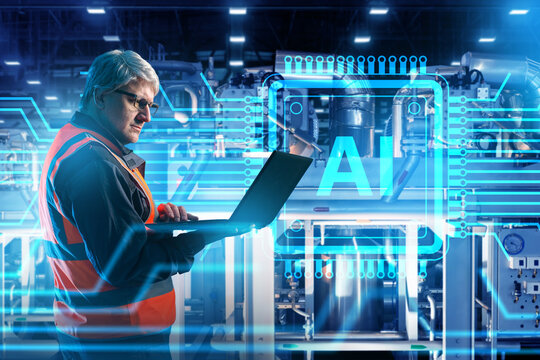 Industrial automation. Engineer uses AI and laptop to monitor factory machinery, optimize production processes and manage intelligent manufacturing systems.