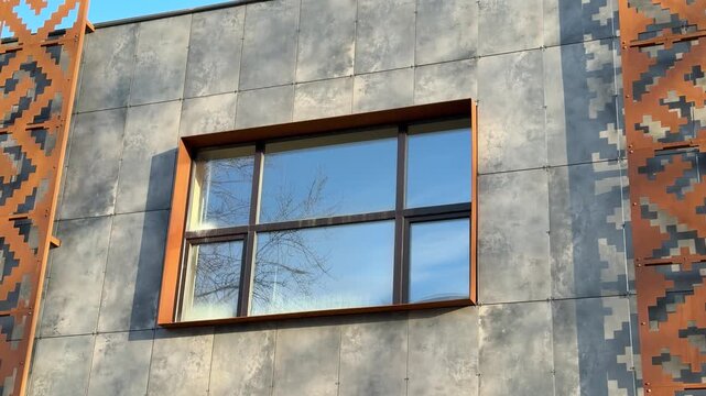 Industrial facade with rusty cladding and patterned metal stripes, raw concrete walls, large storefront windows, dusty