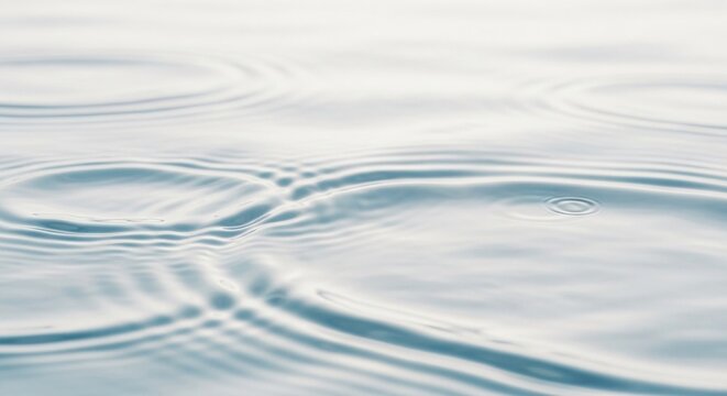 Gentle Water Surface Ripples Showing Subtle Waves and Light Reflections