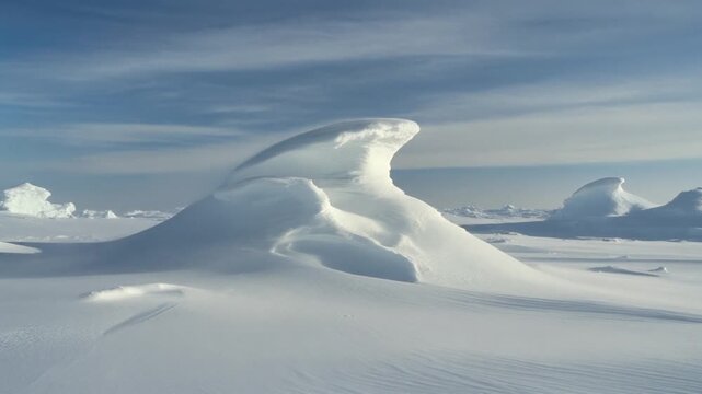 Majestic glacier ice formations in a pristine polar snow landscape.