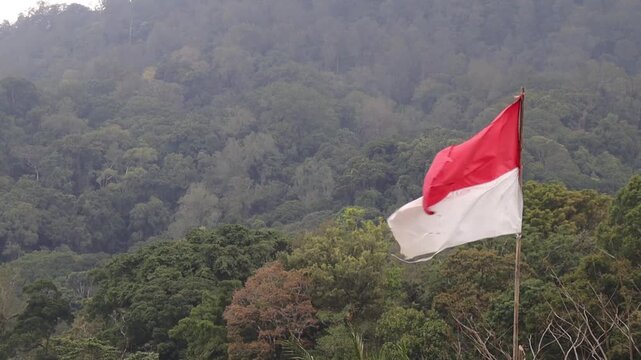 The Indonesian national flag is flying.