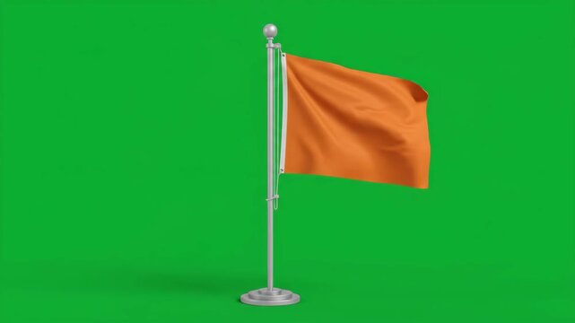 Orange flag waving in the wind on a flagpole with a green screen background, perfect for chroma keying.