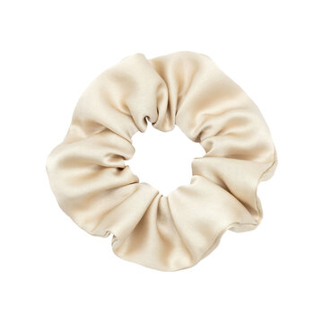 Beige satin fabric scrunchie hair accessory for ponytail styling isolated on a transparent background