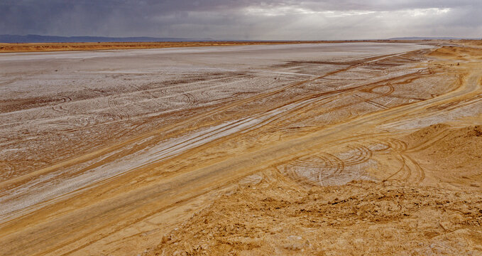 Vast Chott el Djerid Salt Flat with Off-Road Tire Tracks