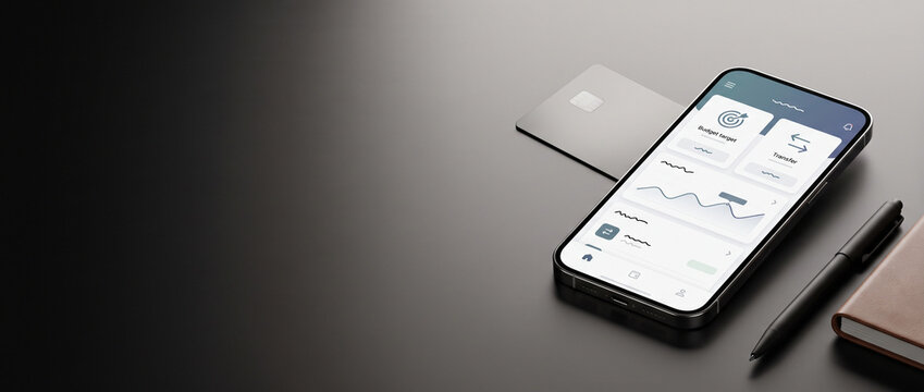 Smartphone with mobile banking app and credit card on dark desk for online payment