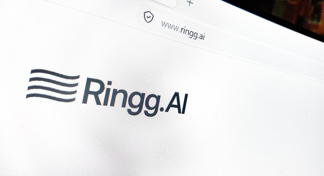  a computer screen with ringg.ai website displayed...Ringg AI provides an enterprise AI voice and chat agent platform that automates inbound and outbound phone calls a