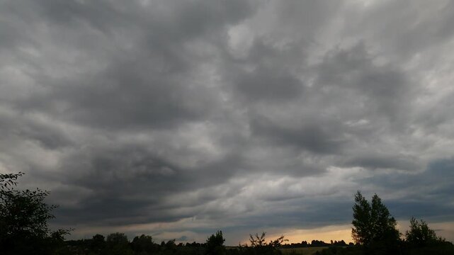 Dramatic Clouds Changing During Colorful Sunset Timelapse