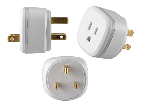 Travel plug adapter electric converter shown in three angles for international power connection, UK to US outlet socket object isolated on black background for global technology concept.
