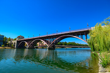 Fototapeta premium Bridges over Drava river in city of Maribor, Slovenia. Main Bridge (Glavni most) or Old Bridge (Slovene: Stari most) over Drava river in Maribor.