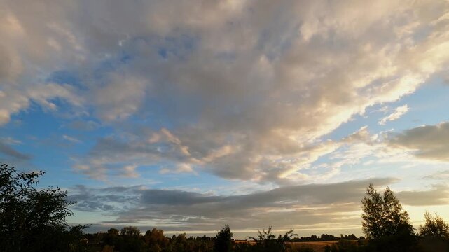 Orange Sunset Light Illuminating Moving Clouds Timelapse
