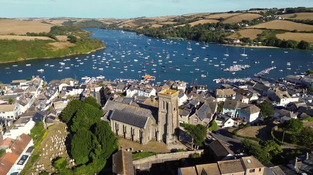Aerial view of historic Holy Trinity Church in coastal South Devon town Salcombe