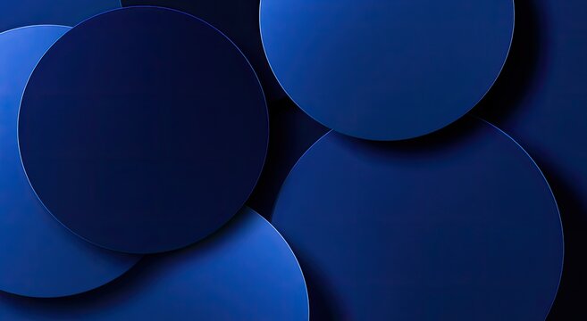 Overlapping deep blue circular shapes with soft shadows