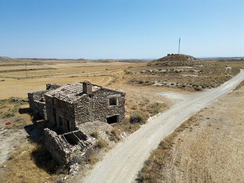 Aerial View of an Abandoned Masia Farmhouse in Rural Aragon, Spain