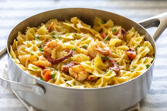 Farfalle pasta with shrimp, octopus and fresh tomato