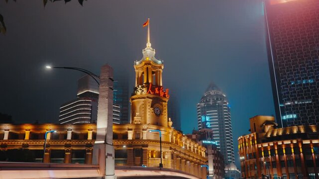 Historic Shanghai Postal Museum in the former General Post Office Building on the banks of Suzhou Creek, featuring its distinctive classical architecture and clock tower Shanghai, China - 30 August 20