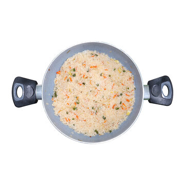 Fried Rice in a Pan with Vegetables during Cooking