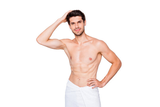Portrait of handsome muscular guy visit hairdresser procedure have silky fresh hairdo enjoy anti dander shampoo stand in bath with white towel isolated over grey color background
