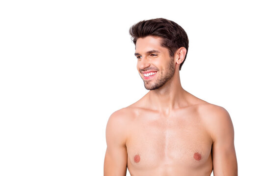 Closeup photo of macho guy perfect neat hairstyle looking side toothy smiling naked torso masculine body groomed metrosexual isolated grey background