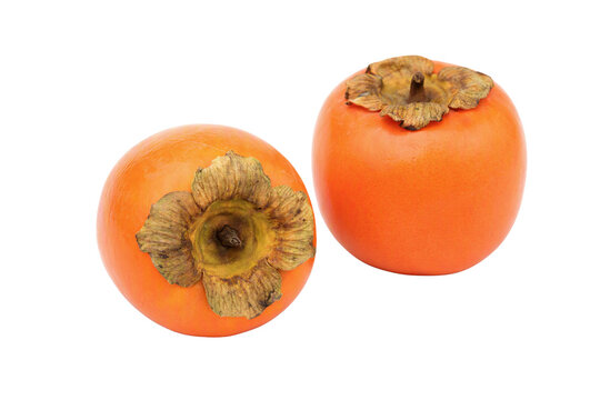 Fresh persimmon fruits pair isolated PNG, two ripe orange persimmons with calyx on transparent background, autumn harvest food