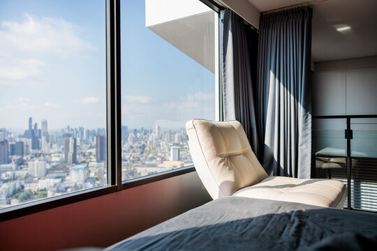 Luxury High-Rise Apartment With Chaise Lounge And City View